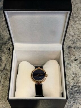 Gucci Gold and Black Women's Round Dial Watch with Black Strap